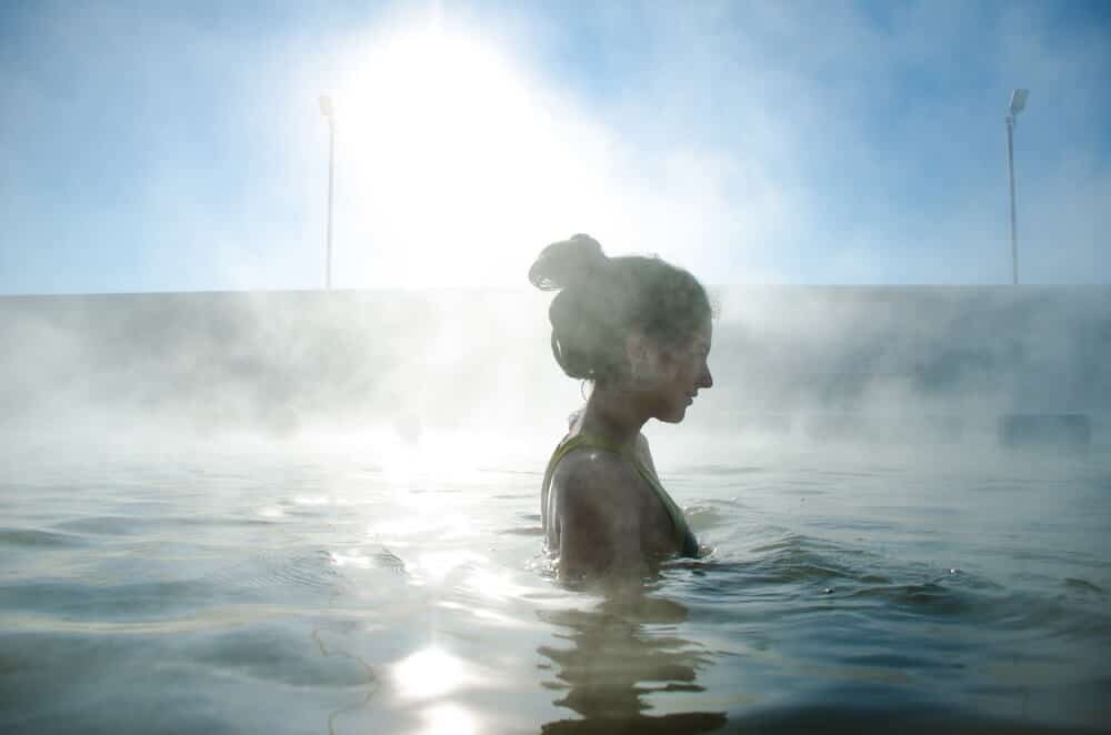 Swimming in thermal water pool