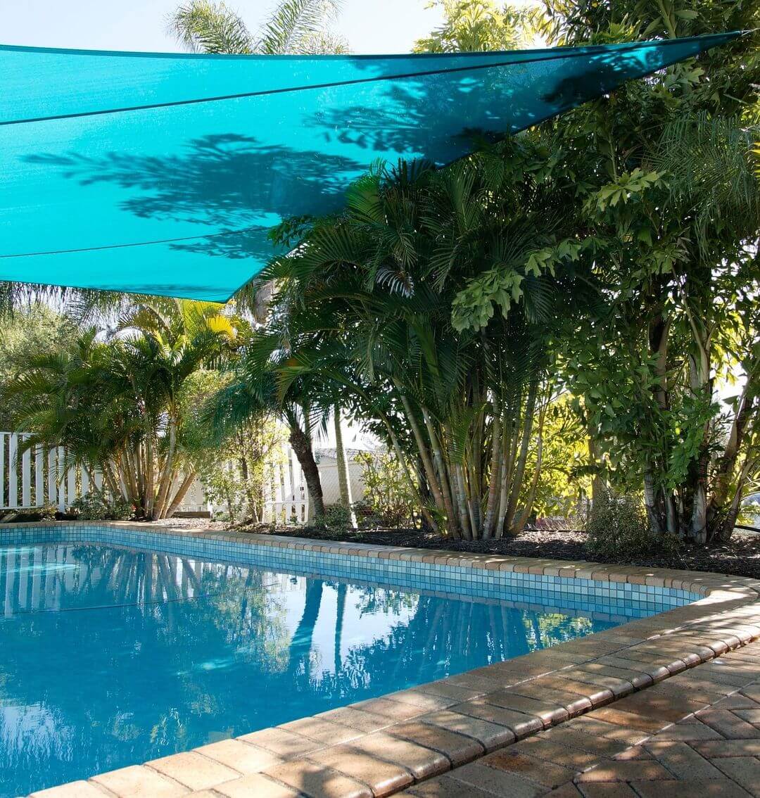 Shade Sail over swimming pool to keep the water cooler.